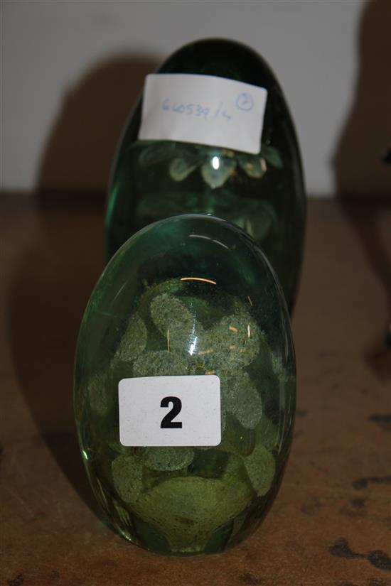 Two green glass dumps